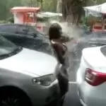 Video Woman Bathing Naked in the Street